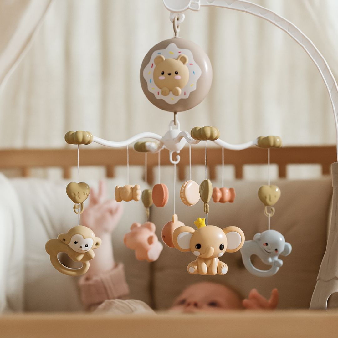 Mobile musical bébé Loomi Baby couleur rose avec projection lumineuse