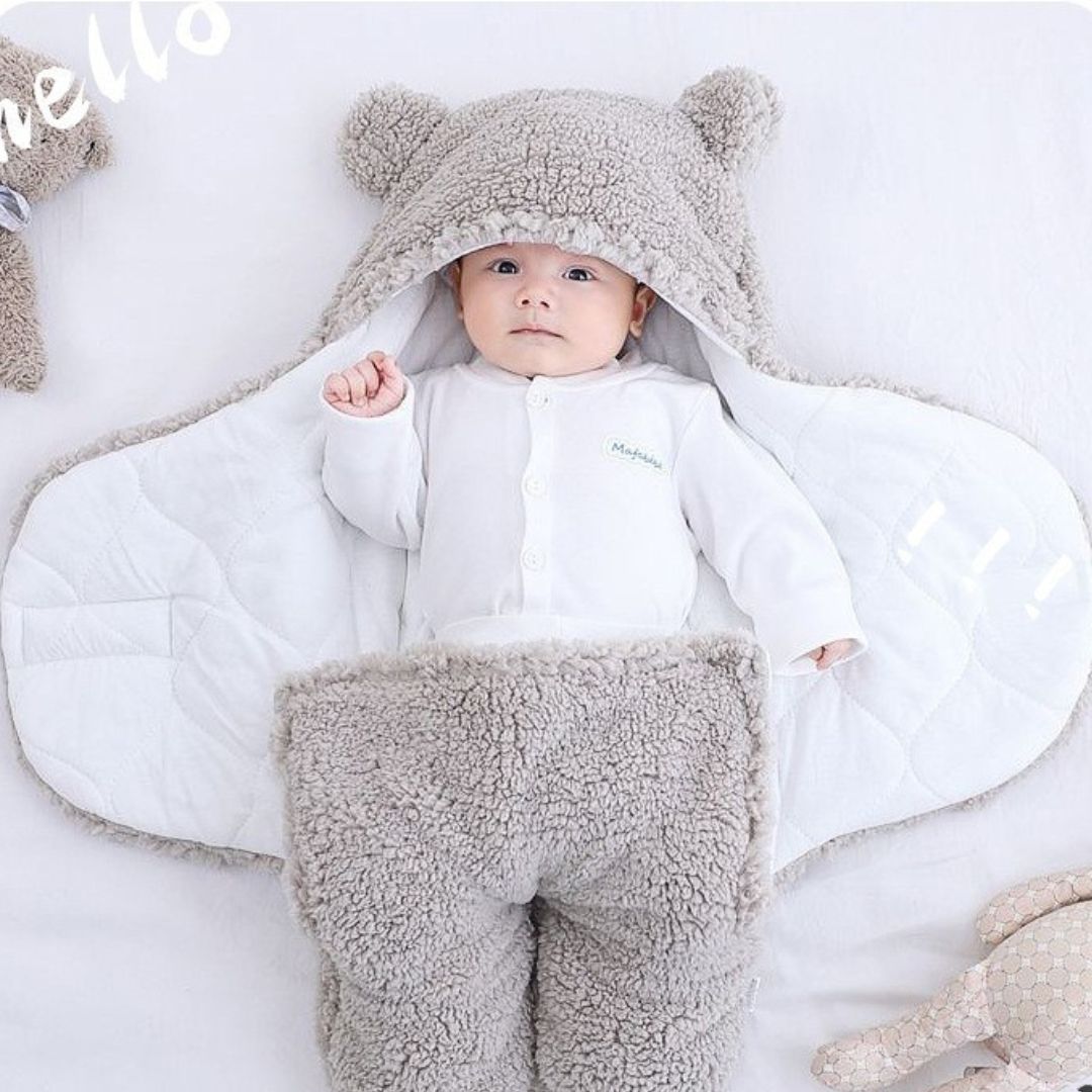 Nid d’ange bébé avec jambes fermées pour plus de chaleur