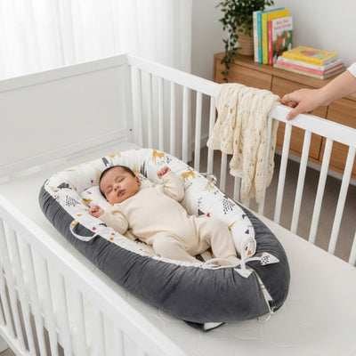 Réducteur de lit bébé dangereux ou pas ?