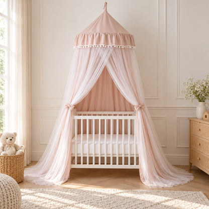 Ciel de lit berceau Pampille beige rosé à double voile au-dessus d'un berceau blanc