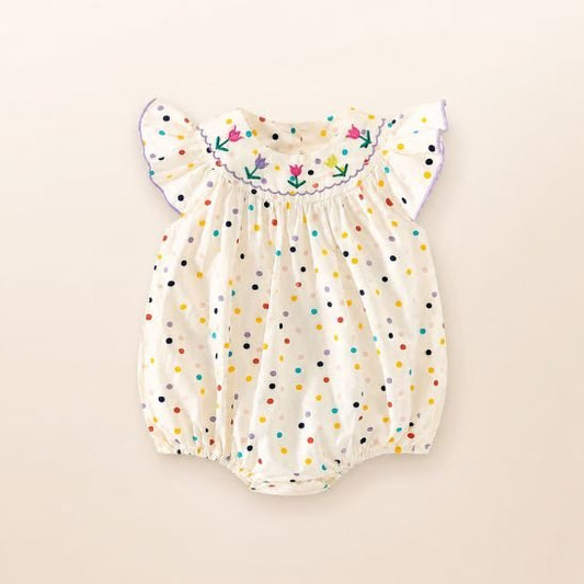 Barboteuse bébé fille col brodé fleurs pois multicolores vue de face manches volantées