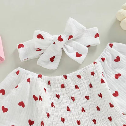 Barboteuse bébé fille coton doux avec motifs cœurs rouges confortable