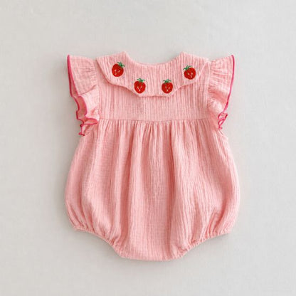 Barboteuse bébé fille en gaze coton avec bandeau assorti et finition fraise brodée