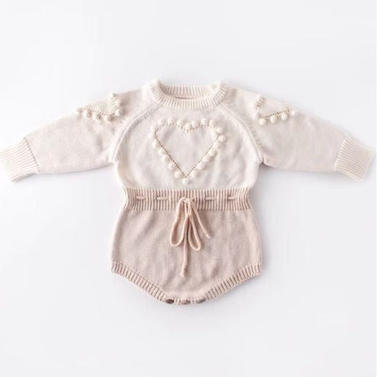 Barboteuse bébé fille tricotée avec cordon ajustable à la taille