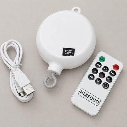 boite à musique bébé avec télécommande, câble USB et carte TF 128 Mo inclus