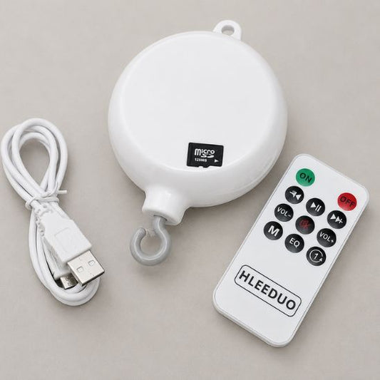 boite à musique bébé avec télécommande, câble USB et carte TF 128 Mo inclus