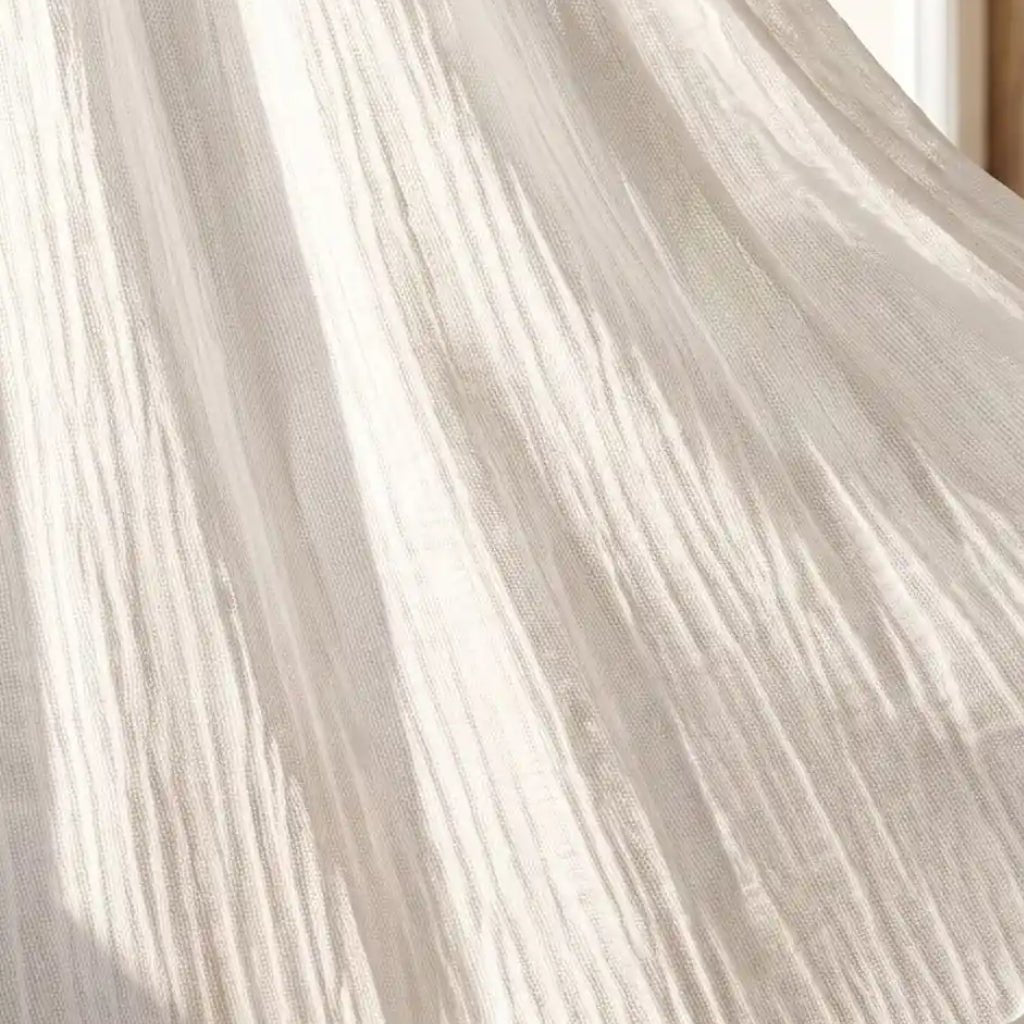 Détail du tissu gaufré en double gaze de coton du ciel de lit