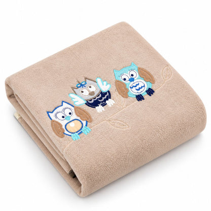 Couverture bébé garçon coloris beige, pliée avec hiboux appliqués