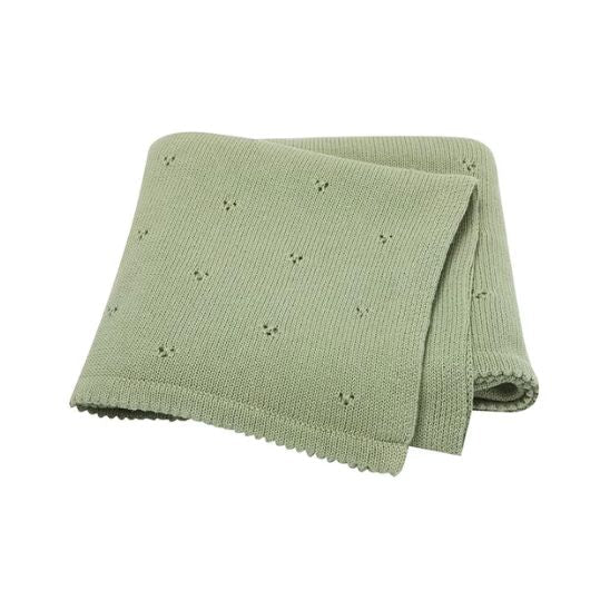 Couverture bébé en coton tricoté coloris vert sauge, motif ajouré