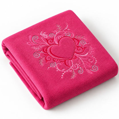 Couverture chaude bébé fuchsia avec cœur brodé, pliée