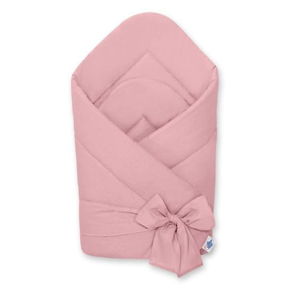 Couverture d'emmaillotage unie coloris rose poudré, vue pliée avec lien noué