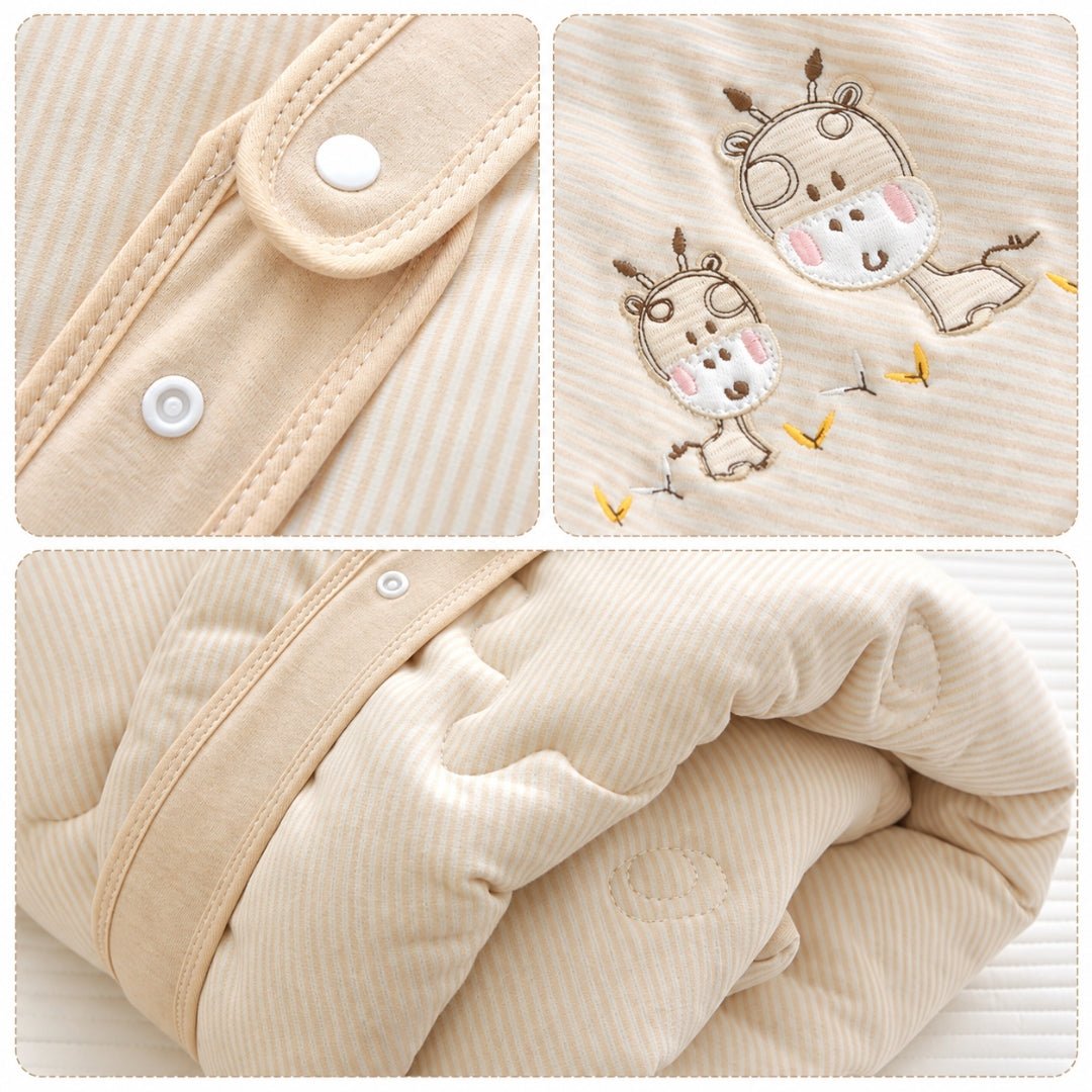 Sangle à pressions, broderie girafe et matelassage en détail