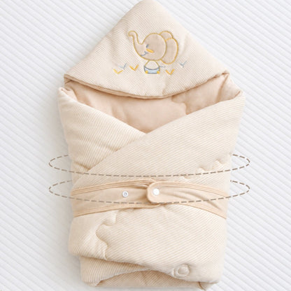 Couverture nid d'ange pliée et fermée par sa sangle à pressions