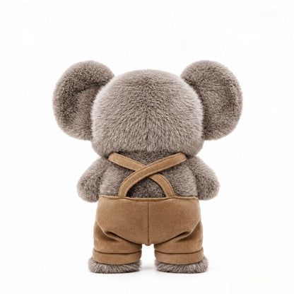 Doudou bébé koala en peluche, vue de dos avec salopette