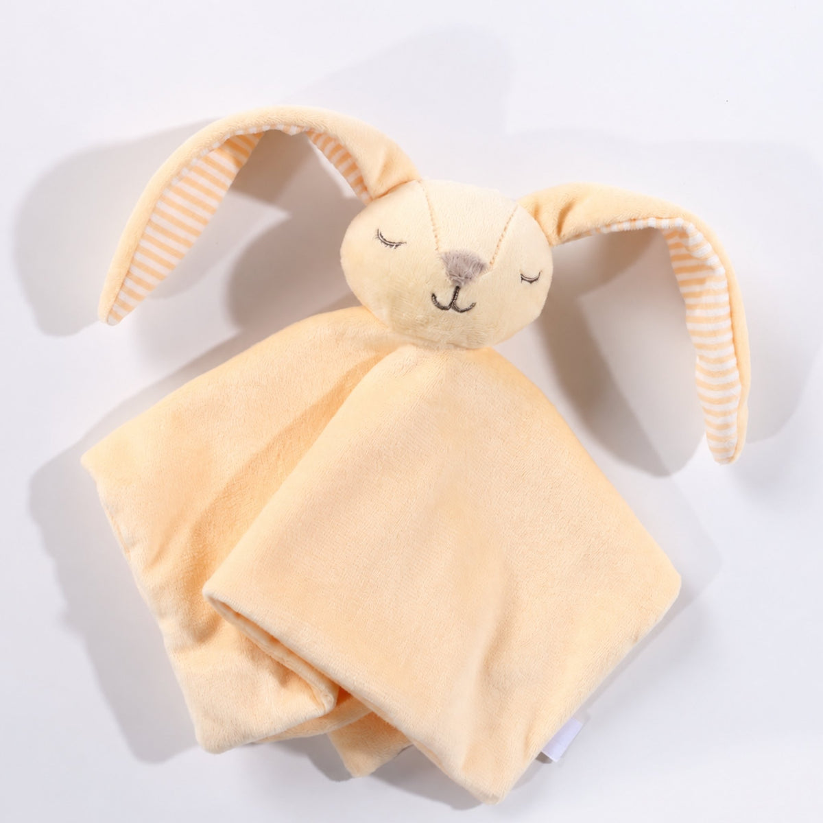 Doudou lapin bébé jaune en velours aux oreilles rayées