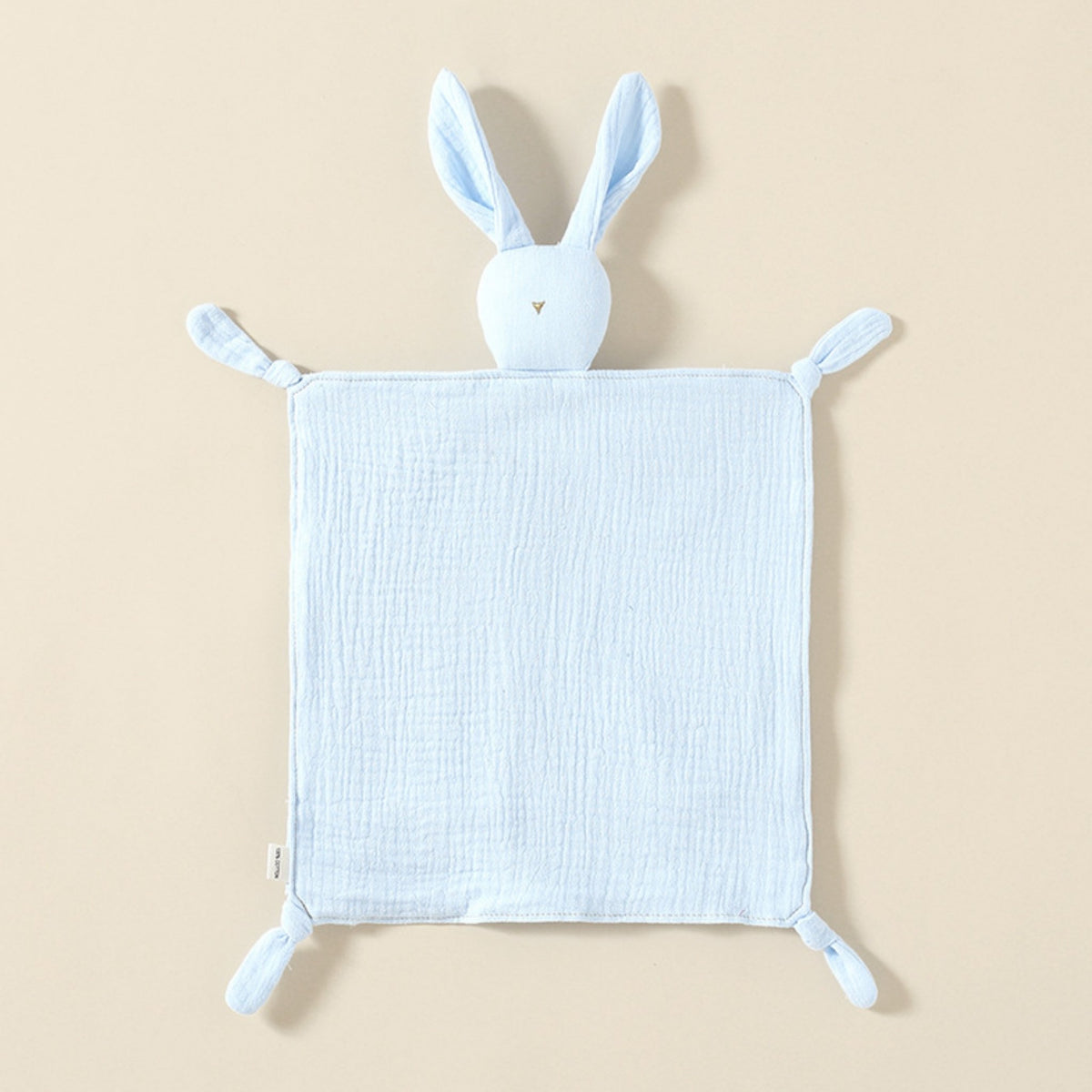 Doudou lapin bleu ciel en gaze de coton, nez brodé doré