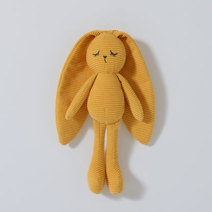 Doudou lapin en velours côtelé jaune moutarde aux longues oreilles