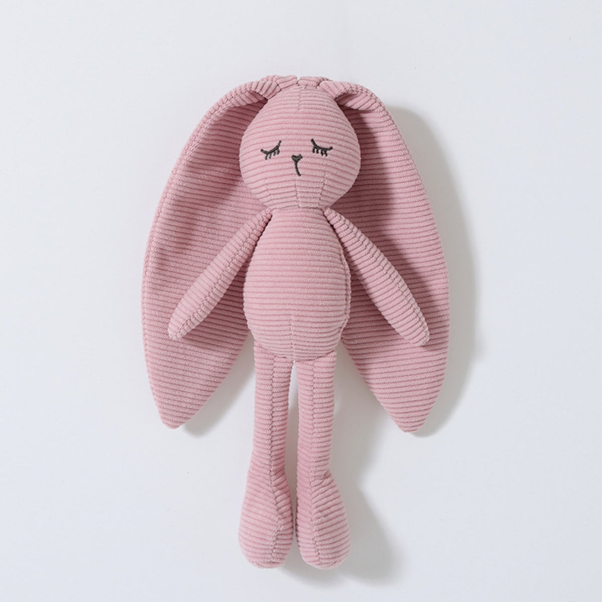 Doudou lapin en velours côtelé vieux rose