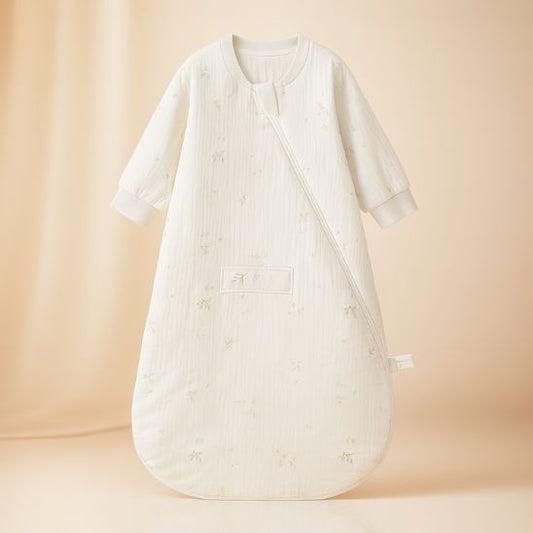 Détail poche avant avec bouton pression sur turbulette bébé coton bio.