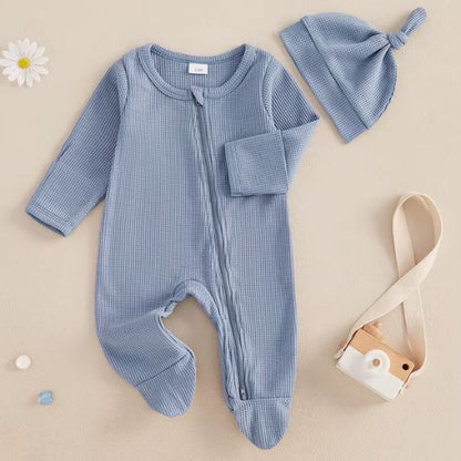 Grenouillère bébé unisexe détail texture maille et finitions soignées