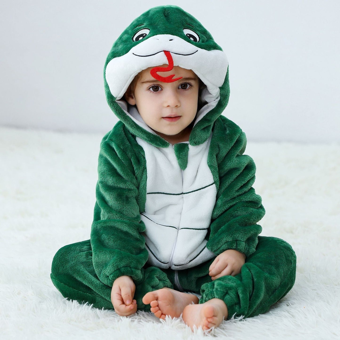 Halloween pyjamas bébé – combinaison dinosaure vert foncé à capuche, zip frontal