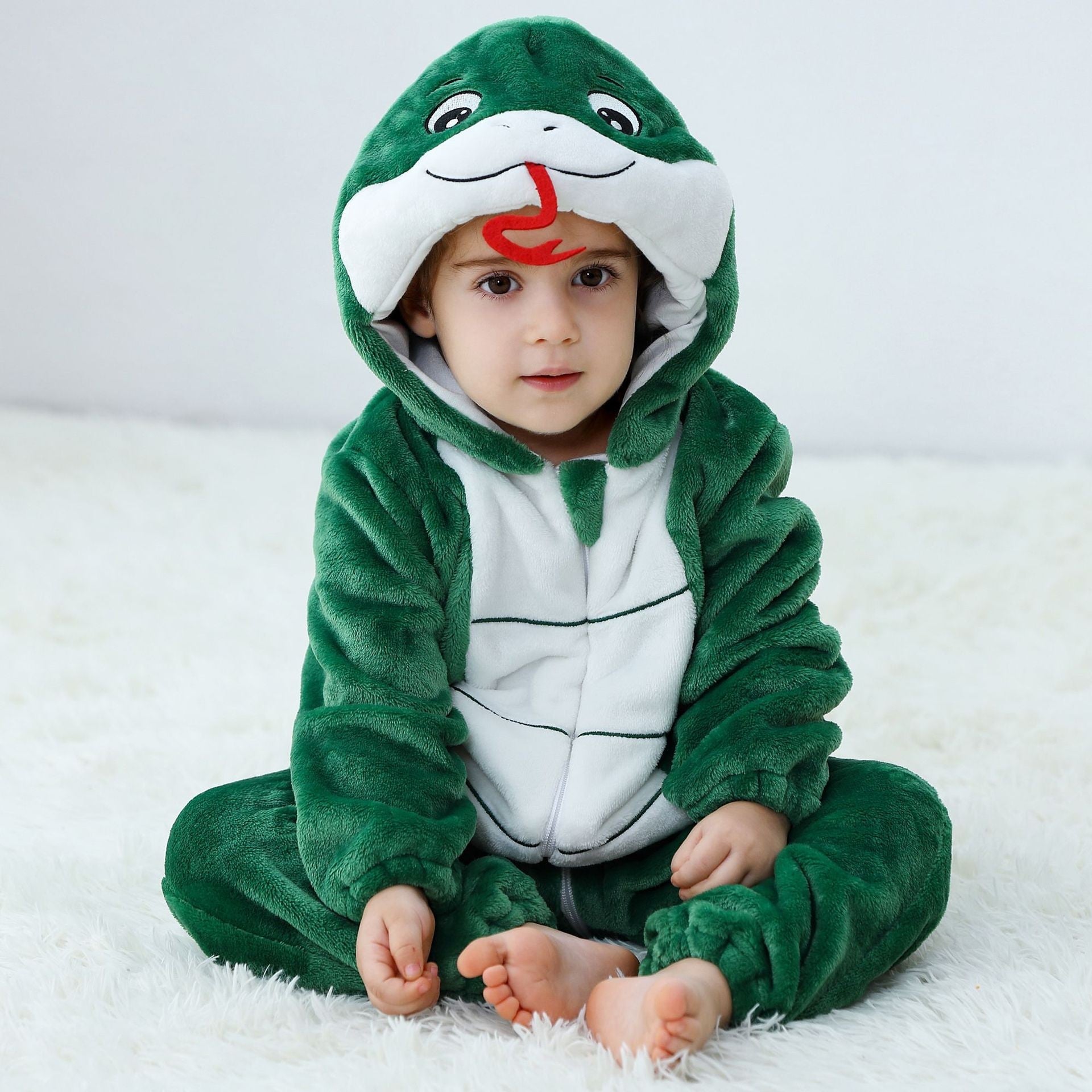 Halloween pyjamas bébé – combinaison dinosaure vert foncé à capuche, zip frontal