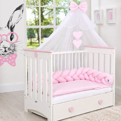 Lit bébé à barreau rose avec ciel de lit et chambre bébé fille