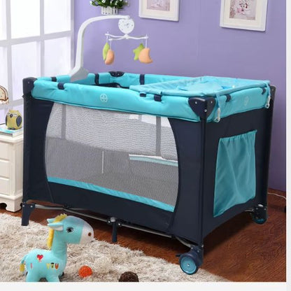 Lit parapluie bébé pliable avec mobile bébé vue d’ensemble