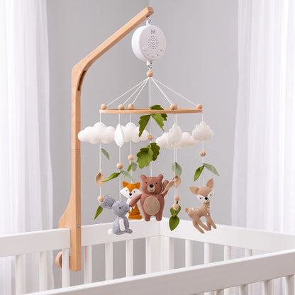 Mobile bébé Animaux de la forêt en feutrine avec bras et boîte musicale
Mobile seul au-dessus du berceau