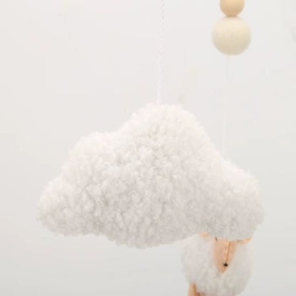 Mobile bébé moutons style scandinave aux tons naturels