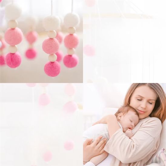 Mobile bébé pompons suspendus au-dessus du lit