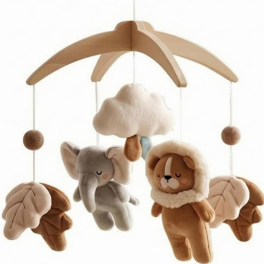 mobile musical bébé bohème lion dans sa capuche, éléphant gris, nuage et feuilles rose poudré et caramel