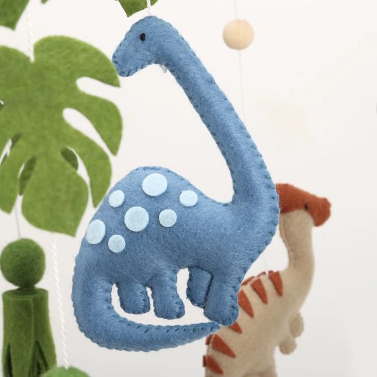 Mobile musical bébé dinosaures au style scandinave naturel