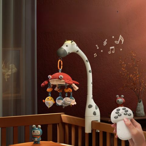 Mobile musical bébé lumineux utilisé la nuit avec télécommande et mélodies apaisantes