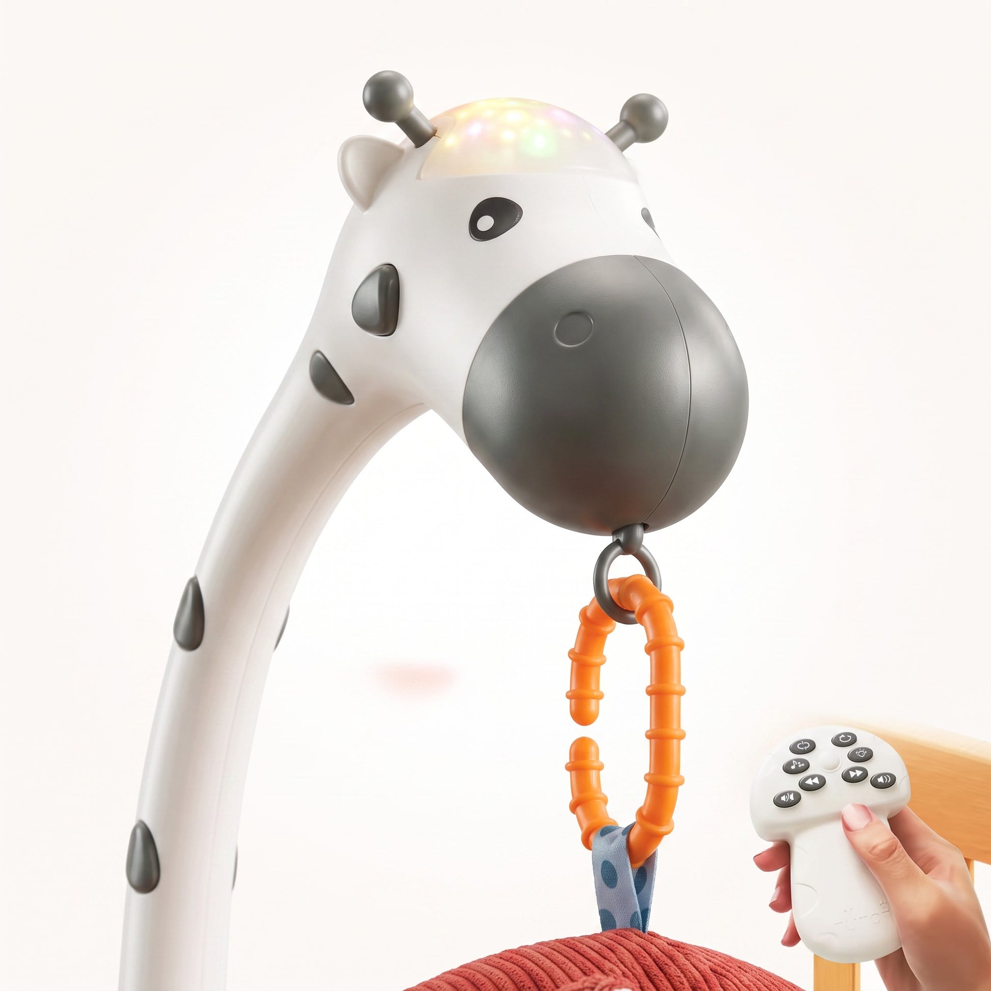 Projection lumineuse et télécommande du mobile musical bébé girafe blanc