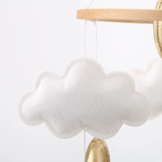 Mobile musicale bébé Kaaba au design équilibré favorisant le calme et l’endormissement