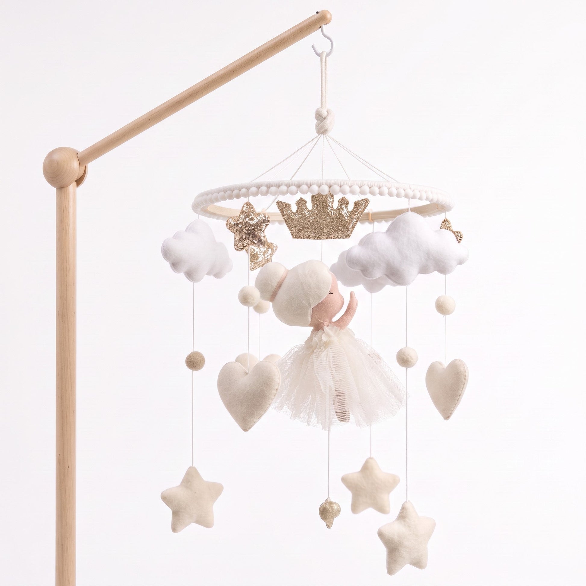 Mobile pour lit bébé Ballerine installé avec son bras de support en bois