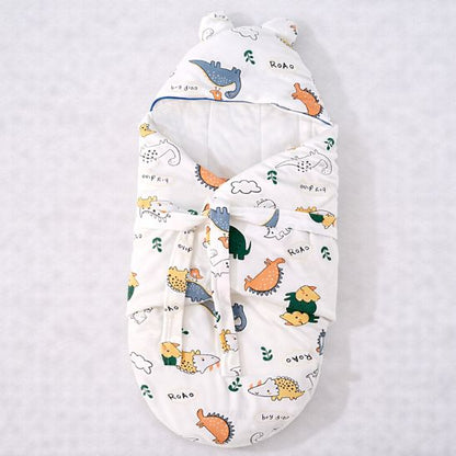 Nid d ange cosy Dino Jungle motif dinosaures vue de dessus fermé