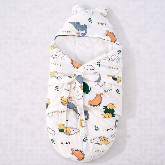 Nid d ange cosy Dino Jungle motif dinosaures vue de dessus fermé