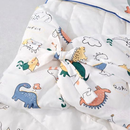 Détail attaches noeud nid d ange cosy Dino Jungle coton pur