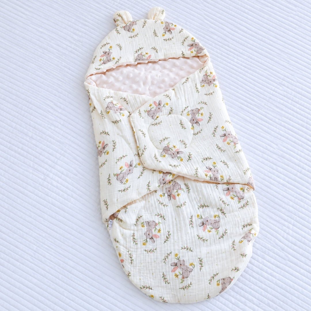 Nid d'ange gaze de coton imprimé lapins et couronnes fleuries