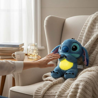 Peluche veilleuse musicale et lumineuse avec ventre lumineux jaune