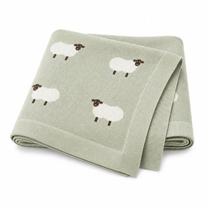 Plaid bébé en coton vert sauge avec moutons brodés, plié