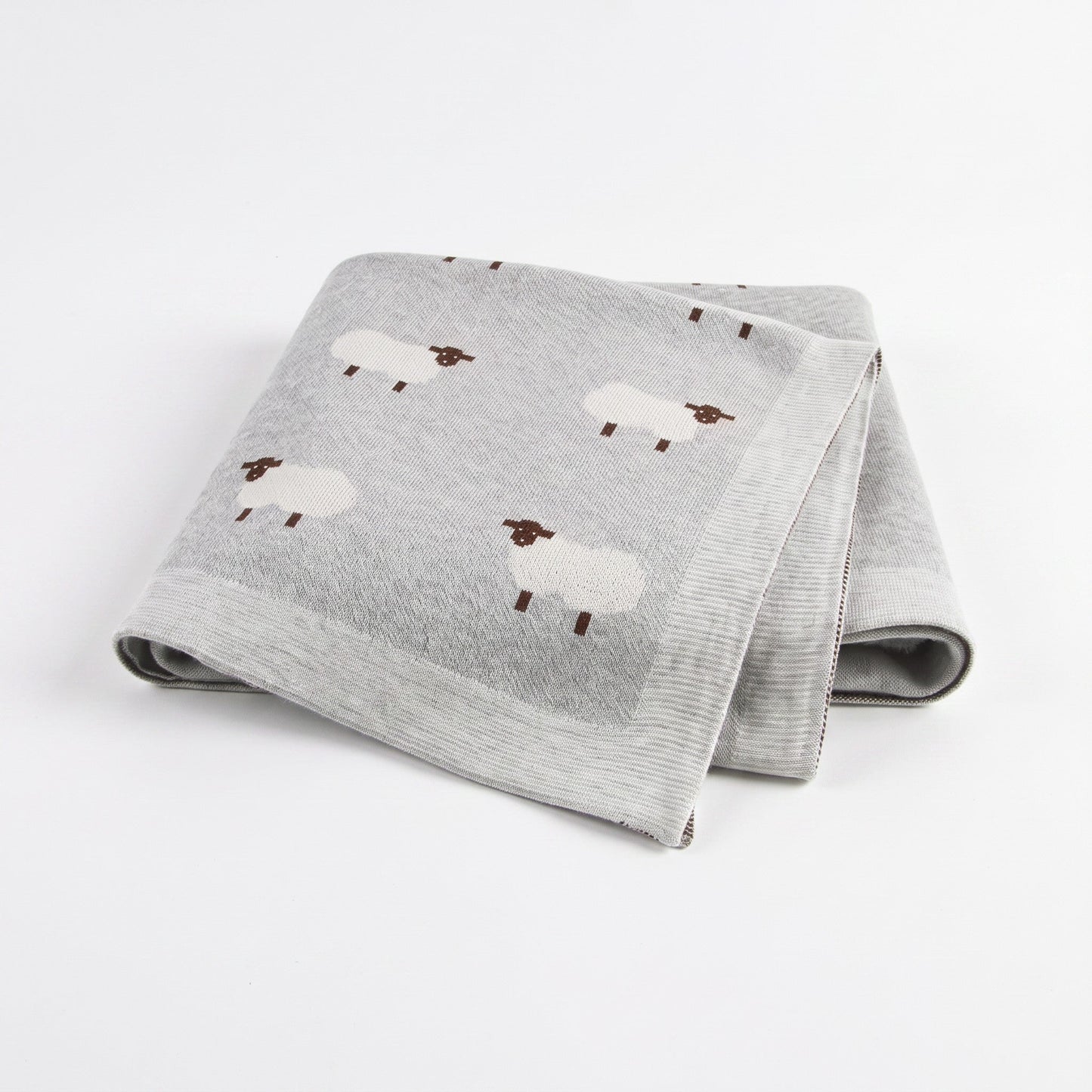 Plaid bébé en coton gris avec moutons brodés, plié
