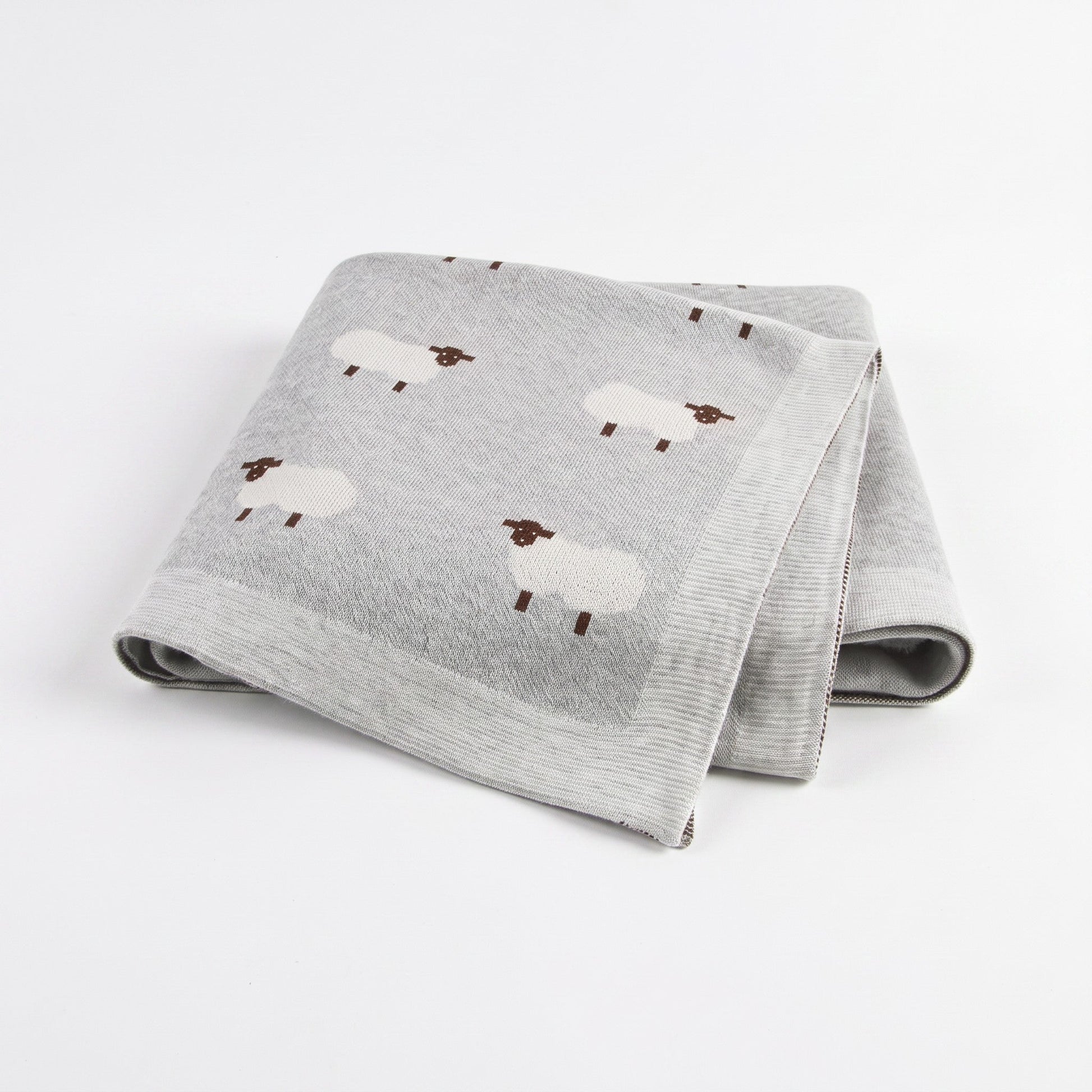 Plaid bébé en coton gris avec moutons brodés, plié