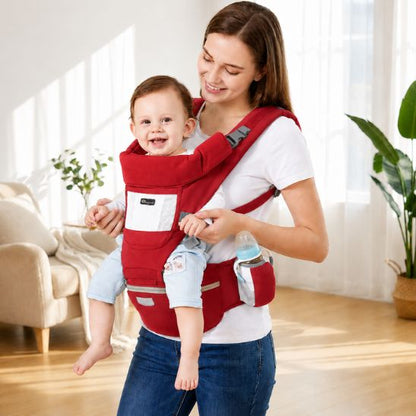 Porte bébé 6 en 1 rouge avec siège de hanche – maman portant un bébé souriant face au monde, porte-biberon latéral intégré