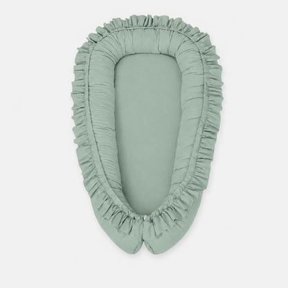 Réducteur de lit bébé à volants menthe, vue de dessus