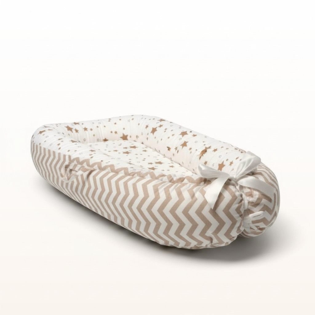 Réducteur de lit bébé étoiles beige hypoallergénique et respirant