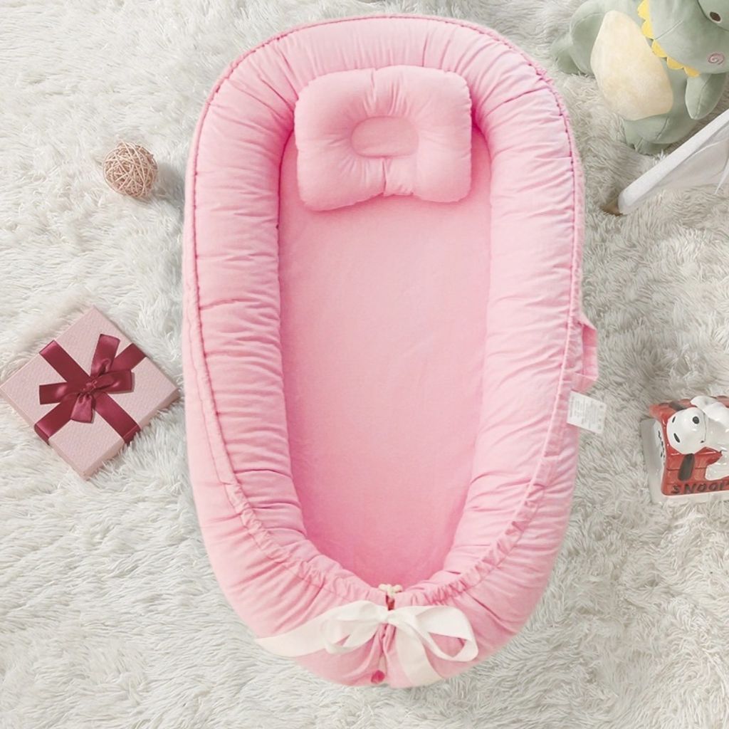 Réducteur bébé rose transportable et léger