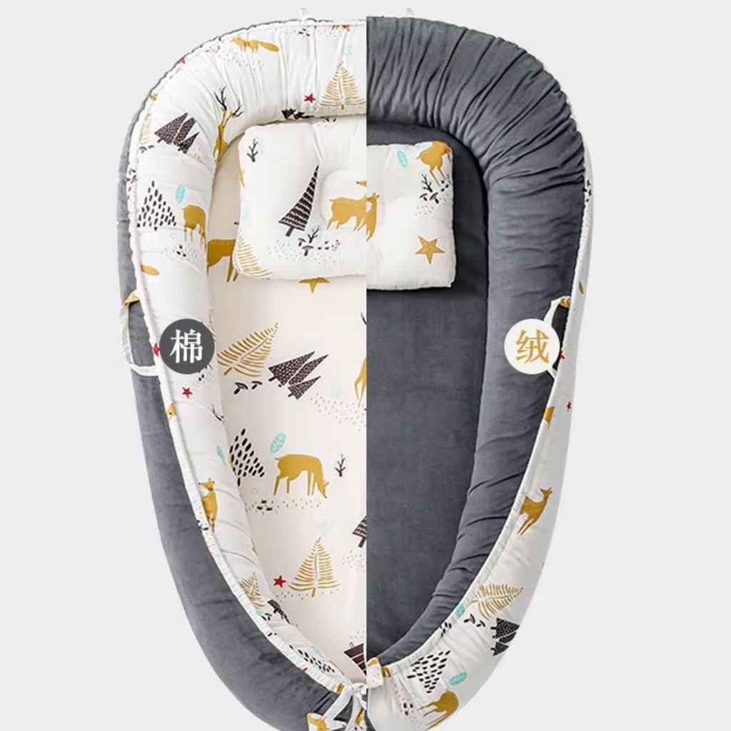 Réducteur de lit bébé Cocon Sérénité réversible avec motifs doux